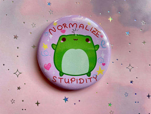 Normalize stupidity Frog Badge